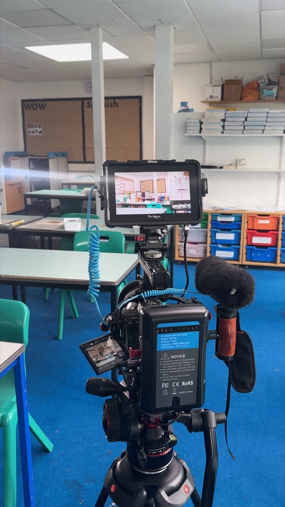 On location in a classroom, behind the scenes