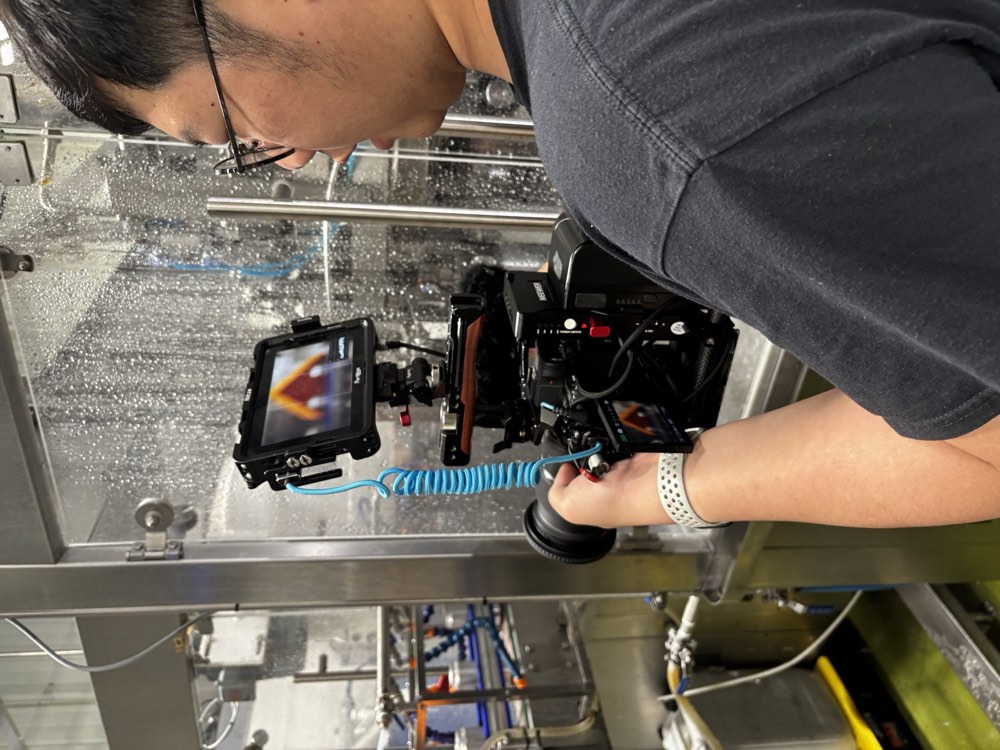Filming on a brewery canning line, behind the scenes