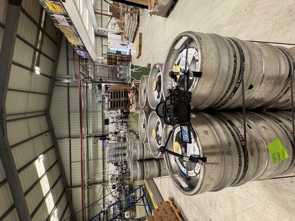 Rigging a product shot in a brewery warehouse, behind the scenes